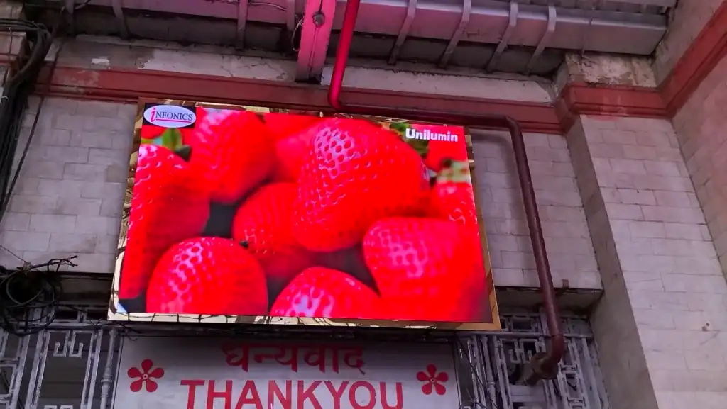 Indoor LED screen showing live visuals