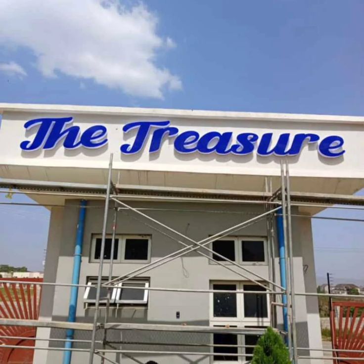 The Treasure liquid letter sign